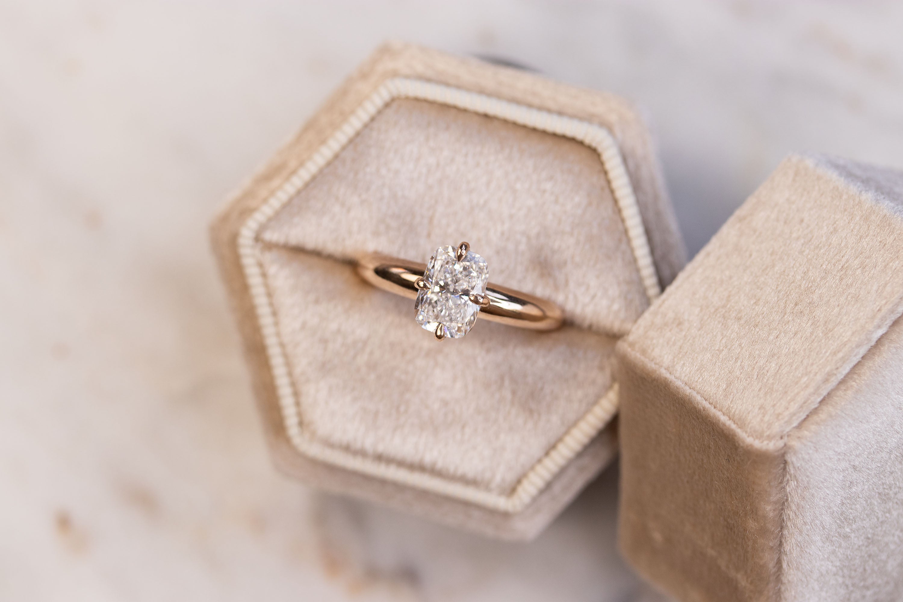 A 14k gold ring with a lab-grown diamond handrcrafted in Lisbon atelier.