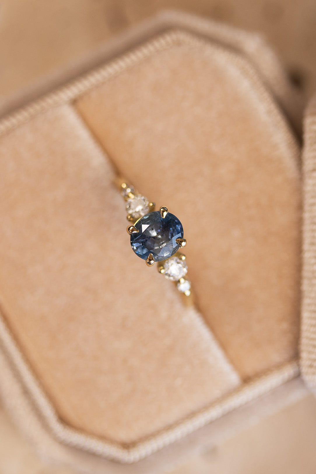 Custom blue sapphire and diamond ring by Amaré Jewelry Lisbon, unique bespoke engagement jewelry inspired by the Atlantic ocean.